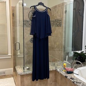Women’s long cold shoulder long gown.